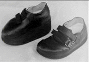 picture of custom made velcro adjusted shoes